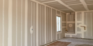 Freshly installed drywall boards in a new home interior during drywall boarding and finishing in Chilliwack.